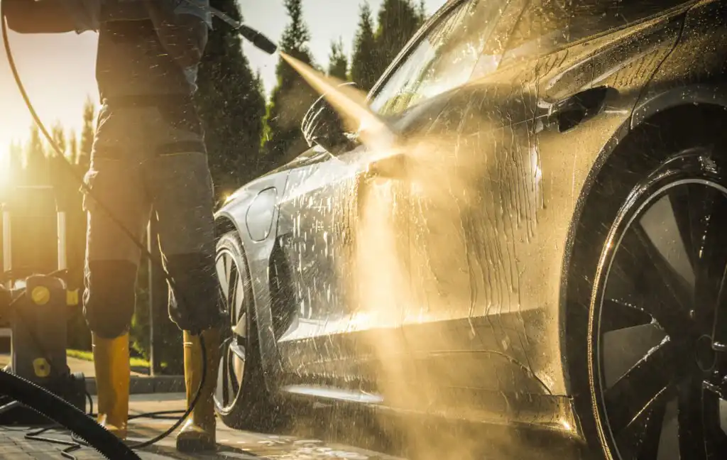 Men Washing His Car